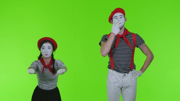 Mimes Actors On Green Background
