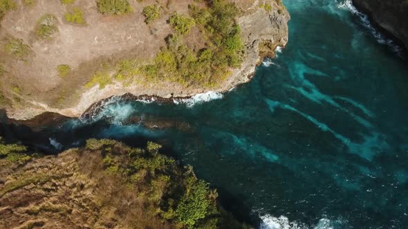 Cliffs, Sea and Waves at Nusa Penida, Bali, Indonesia alt