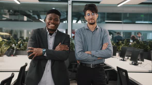 Multiracial Couple of Business Colleagues Smiling Diverse Coworkers Arabian Young Man African alt