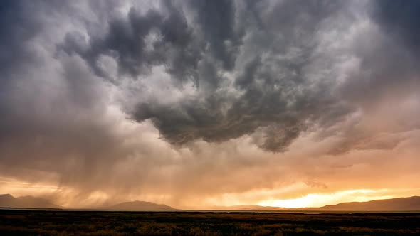 Storm clouds building at sunset alt
