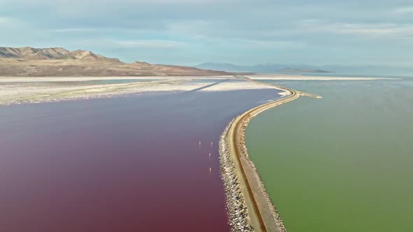 AERIAL - Railroad tracks in Lucin Cutoff, Great Salt Lake, Utah, circle pan alt
