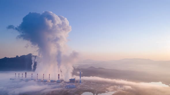 Steam or mist over Aerial view of Coal Power Plant.