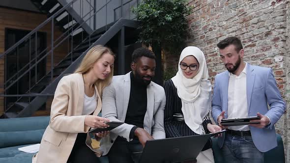 Business People Uses Digital Technology while Discussing theirs Conference Partnership alt