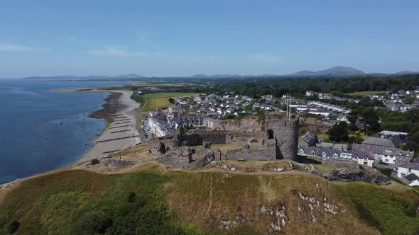 Drone footage of Criccieth Castle on the North Wales Coast in the area of Gwynedd, Wales, UK alt