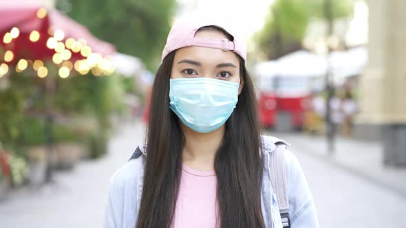 Portrait of asian woman with face mask. 