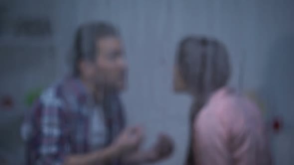 Angry Man Shouting and Grabbing Wifes Hair, Assault in Family, Rainy Weather alt