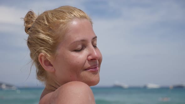 Blond woman on beautiful beach slow motion 1920X1080 HD footage - Caucasian  female on  French coast alt