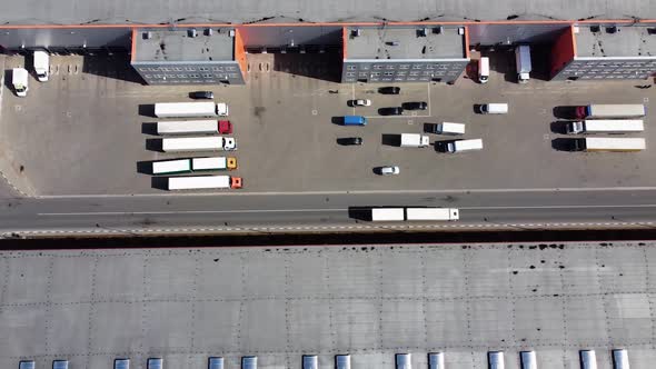 Truck with a trailer drives through the territory of the logistics ...