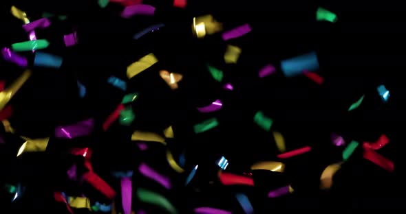 4K - Real Colorful Confetti Burst on Black Background alt