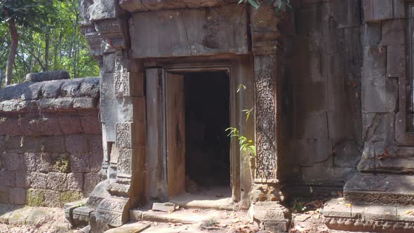 Male Actor Coming Out From a Passage in the Temple alt
