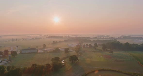 Aerial View with Beautiful Misty Sunrise Landscape Foggy Morning at Scenic Meadow alt
