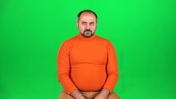 Caucasian Man Throws Up His Hands and Squirms His Face, Feels Disappointed. Green Screen. Slow alt