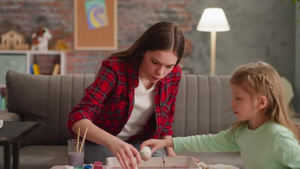 Teenage and Little Girl Color and Look at Ebru Decor Eggs alt