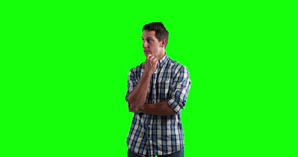 Caucasian man in a green background