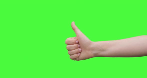 Isolated Woman Hand Showing Thumbs Up or Like Sign Symbol. Green Screen Compositing.  alt