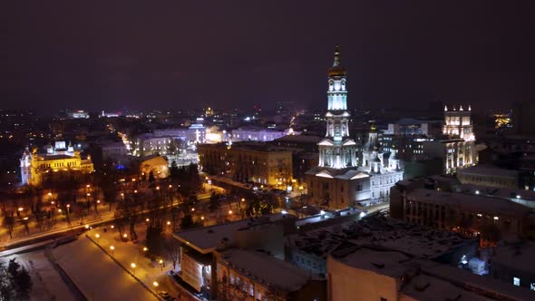Winter night Kharkiv illuminated city aerial view