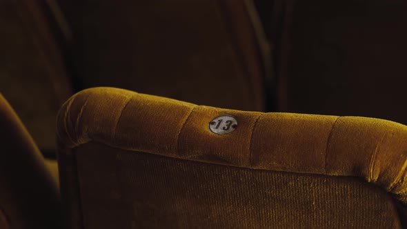 velvet chair with number thirteen in cinema