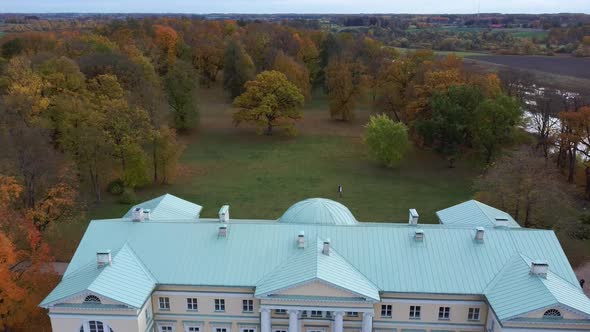 Autumn Aerial Landscape of the City Mezotne and Palace With Park Near Lielupe River, Latvia 4K Video alt