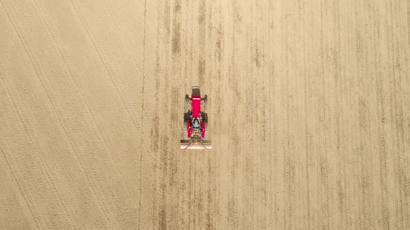 Tractor at Work in Field Top View alt