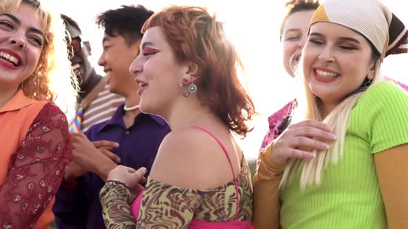 Young people having fun dancing outdoor - Concept of multiracial friends and diversity