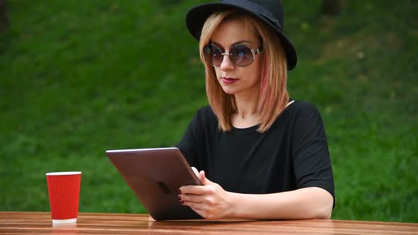 Hipster Girl Using Digital Tablet