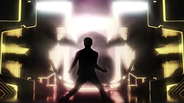 A Silhouette Man Dancing Against A Lighting Stage