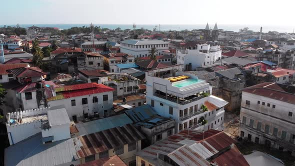 Aerial View of Stone Town Zanzibar City Slum Roofs and Poor Streets Africa alt