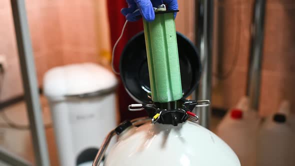 Dewar Vessel with Liquid Nitrogen with Frozen Embryos and Eggs in a Cryobank in a Modern IVF Clinic alt