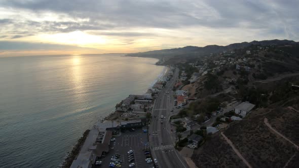 Malibu California Coastline Las Flores Canyon Aerial View At Sunset Traffic On Pacific Coast Highway alt