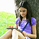 Teenage Girl Using Digital Tablet in Park 1 - VideoHive Item for Sale