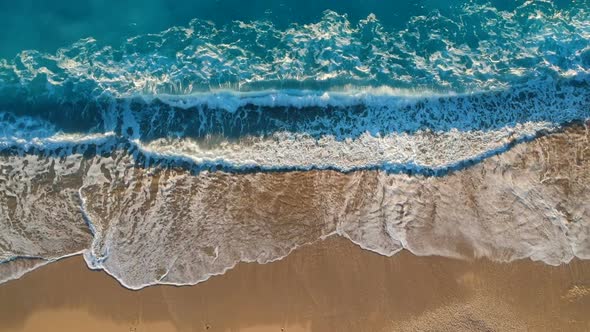 Waves rolling onto a beach