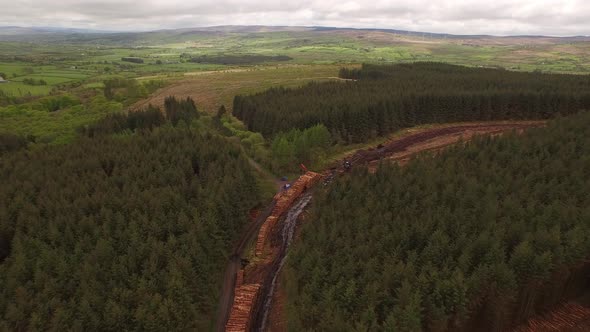 Forestry and logging operations taking place in the highlands of Scotland using large industrial mac alt