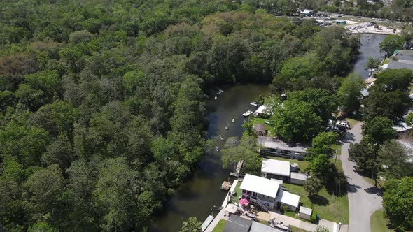 weekend kayakers paddle up the Weeki Wachee River near Roger's Park.  A beautiful family and friends alt