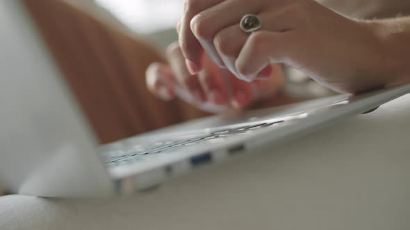 Female Hands Typing on Laptop alt