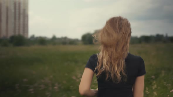 Running Woman Workout. Fit Woman Cardio Training. Runner Workout On Grass Field. Running Legs Foot.. alt