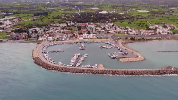 Aerial Drone Video of Zygi Marina Harbour in Cyprus Blue Mediterranean Sea Yachts Boats Greece Ocean alt