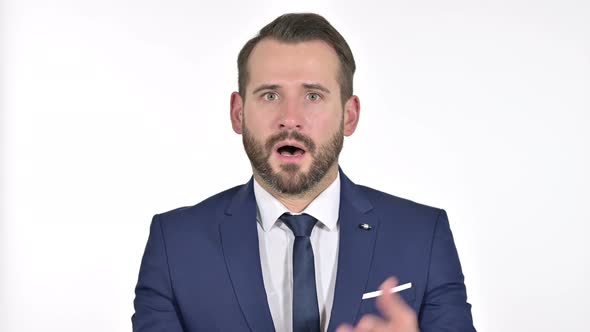 Upset Businessman Feeling Shocked, White Background alt