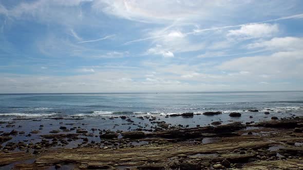 A scenic rocky beach coastline. alt