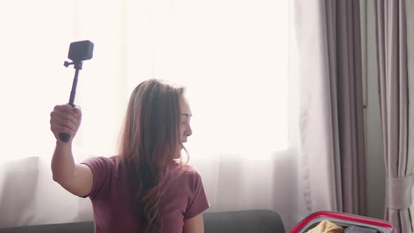 Tourism blogger recording video selfie talk with the audience for a travel trip. alt