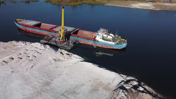 Aerial view of loading dry cargo ship.