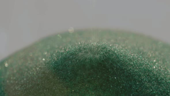 Green Crumbling Grains of Sand Closeup