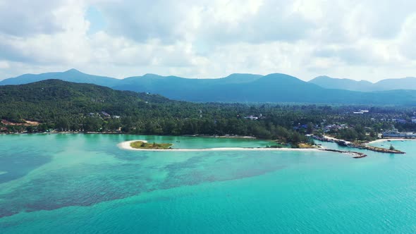Ao Nai Wok, and Ko Pha Ngan island, Thailand. Aerial panorama. Beatuiful aqumarine sea water and mou alt
