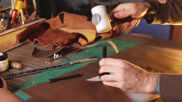 Tanner Works with Leather Makes Purse Manual Labor Small Business Production