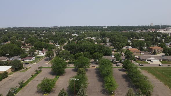 Mixed residential and business neighborhood in Bismarck, North Dakota. Tree lined streets.