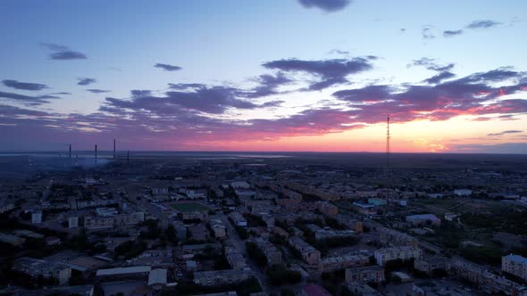 Pink Sunset Over a Small Town alt