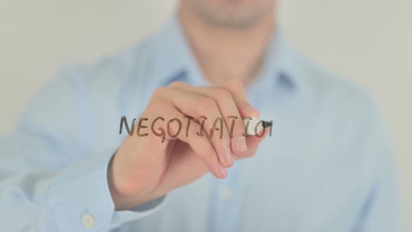 Negotiation, Man Writing on Transparent Glass Screen alt