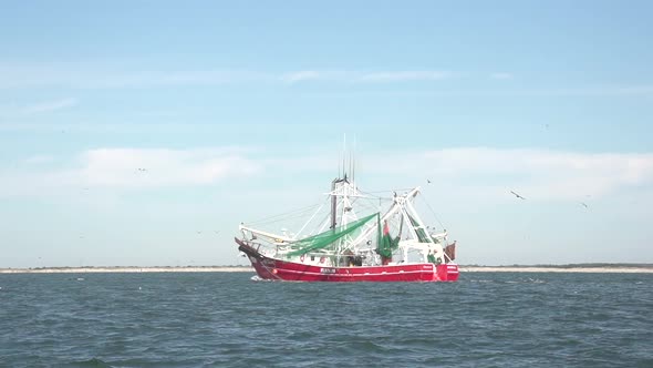 a shrimp boat on the water alt