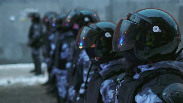 Team of Armored Riot Unit Police Officers Blocking Street Emergency Situation alt