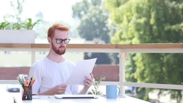 Paperwork, Reading, Designer Sitting in Balcony of Office Outdoor alt