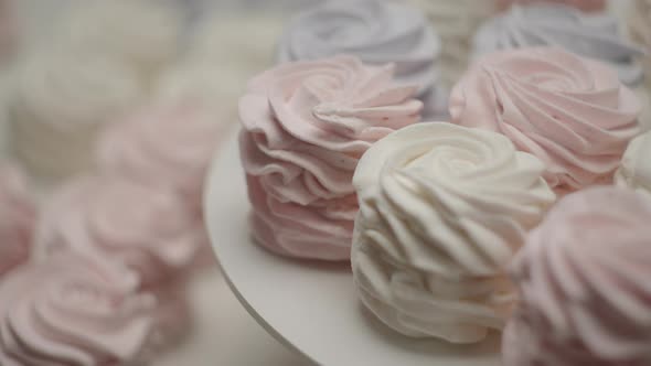 Stack of color confectionery rotating in slow motion. alt